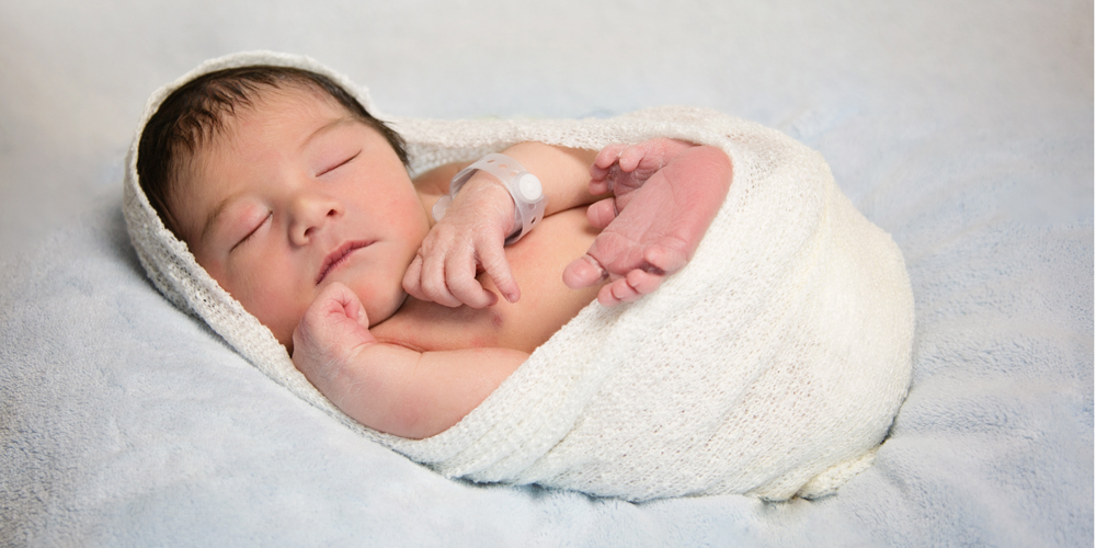 Newborn in Hospital photographed for Denver Health's Newborns in Need Calendar